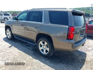 2016 Chevrolet Tahoe LT z VIN 1GNSCBKC8GR210829, wystawiony jako IAAI lot #42459936 z przebiegiem 160 518 mil mil oraz . Historia ofert i sprzedaży dostępna na DreamBid. Obrazek 3.