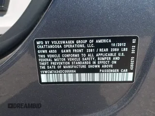 2013 Volkswagen Passat SEL Premium with VIN 1VWCM7A34DC055684, listed as a IAAI auction lot 42039636 with 167,746 mi miles. Bid and sale history available at carsss.com. Image 9.