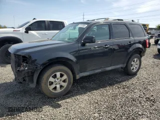 2011 Ford Escape Limited with VIN 1FMCU9EGXBKA75058, listed as a Copart auction lot 51312665 with 121,220 mi miles and Salvage Title. Bid and sale history available at DreamBid. Image 1.