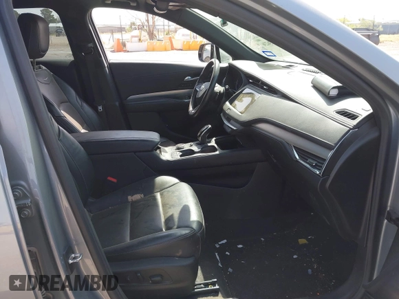 2023 Cadillac XT4 AWD Premium Luxury with VIN 1GYFZDR47PF163923, listed as a IAAI auction lot 42136236 with 52,012 mi miles and . Bid and sale history available at DreamBid. Image 5.