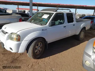 2003 Nissan Frontier 4WD SVE with VIN 1N6MD29Y93C451874, listed as a IAAI auction lot 41470198 with 216,482 mi miles. Bid and sale history available at carsss.com. Image 2.