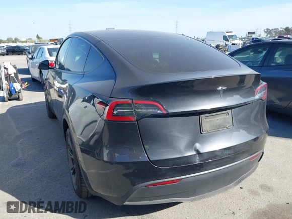 2025 Tesla Model Y Long Range with VIN 7SAYGDED2SF228414, listed as a IAAI auction lot 41706470 with 11,319 mi miles and . Bid and sale history available at DreamBid. Image 3.