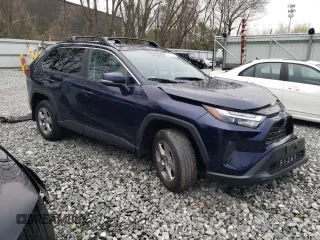2023 Toyota RAV4 XLE with VIN 2T3P1RFV1PW363786, listed as a Copart auction lot 53697715 with 8,220 mi miles and Salvage title. Bid and sale history available at DreamBid. Image 4.