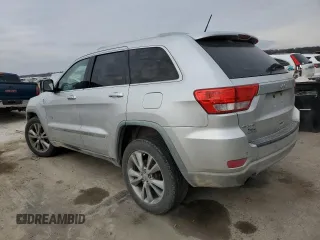 2011 Jeep Grand Cherokee 70th Anniversary with VIN 1J4RR4GT0BC666579, listed as a Copart auction lot 87322784 with 163,439 mi miles and Salvage Title. Bid and sale history available at carsss.com. Image 2.