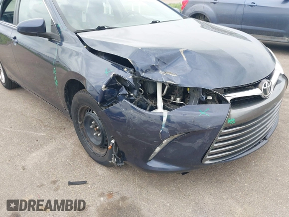 2017 Toyota Camry XLE with VIN 4T1BF1FK0HU701093, listed as a IAAI auction lot 42347800 with 165,725 mi miles and . Bid and sale history available at DreamBid. Image 6.
