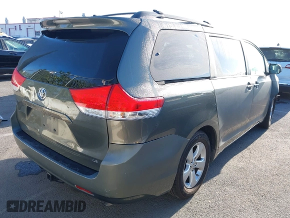 2013 Toyota Sienna LE AAS with VIN 5TDKK3DC0DS313786, listed as a IAAI auction lot 41981268 with 162,423 mi miles. Bid and sale history available at carsss.com. Image 4.