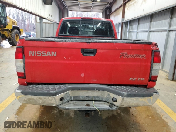 1999 Nissan Frontier XE with VIN 1N6ED26Y5XC308158, listed as a Copart auction lot 84320904 with 316,532 mi miles and Clean title. Bid and sale history available at DreamBid. Image 6.