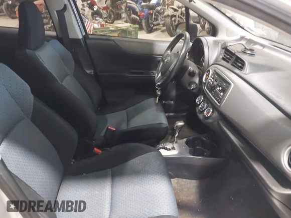 2012 Toyota Yaris L with VIN JTDKTUD31CD511550, listed as a IAAI auction lot 42157934 with 131,183 mi miles. Bid and sale history available at carsss.com. Image 5.