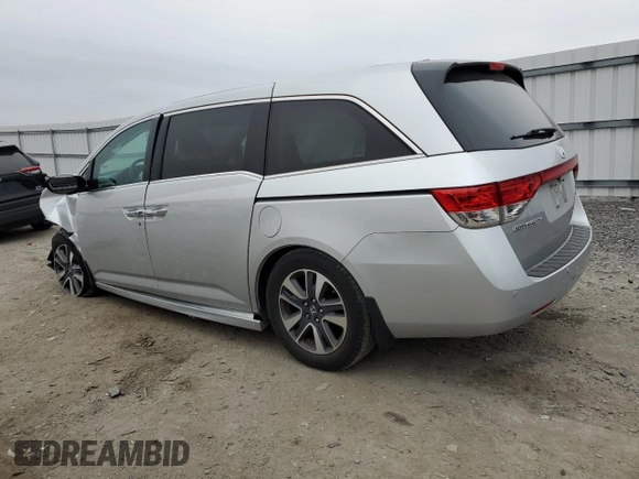 2015 Honda Odyssey Touring Elite with VIN 5FNRL5H92FB114509, listed as a Copart auction lot 43801615 with 106,054 mi miles and Salvage title. Bid and sale history available at DreamBid. Image 2.
