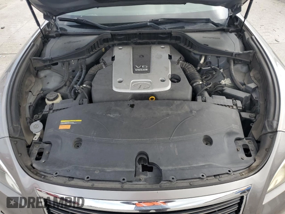 2013 Infiniti M z VIN JN1BY1AP9DM514188, wystawiony jako Copart lot #57634155 z przebiegiem 170 910 mil mil oraz Szkoda całkowita • Salvage title. Historia ofert i sprzedaży dostępna na DreamBid. Obrazek 11.