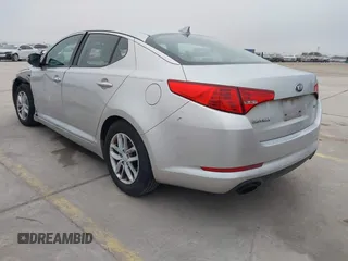 2013 Kia Optima LX with VIN KNAGM4A79D5377485, listed as a IAAI auction lot 41290306 with 172,253 mi miles. Bid and sale history available at carsss.com. Image 3.