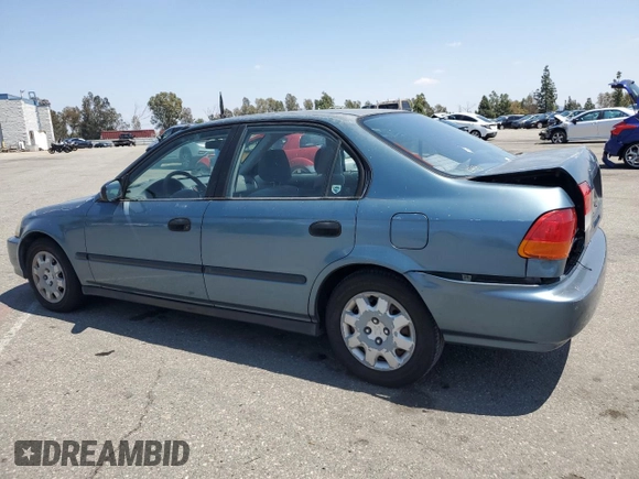 1998 Honda Civic DX with VIN JHMEJ6624WS000450, listed as a Copart auction lot 54217265 with 299,994 mi miles and Salvage Title. Bid and sale history available at carsss.com. Image 2.