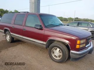 1999 GMC Suburban with VIN 1GKEC16R3XJ707787, listed as a IAAI auction lot 41826640 with 175,437 mi miles. Bid and sale history available at carsss.com. Image 1.