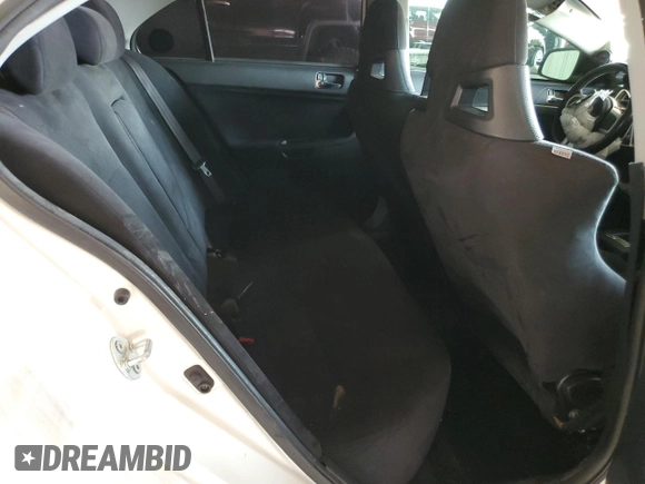 2010 Mitsubishi Lancer Evolution SE with VIN JA32W6FV8AU034077, listed as a Copart auction lot 64098154 with 120,041 mi miles and Salvage Title. Bid and sale history available at carsss.com. Image 10.