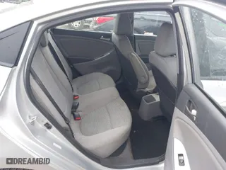 2015 Hyundai Accent GLS with VIN KMHCT4AE7FU849786, listed as a IAAI auction lot 41965237 with 98,587 mi miles. Bid and sale history available at carsss.com. Image 8.