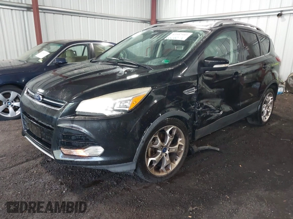 2015 Ford Escape Titanium with VIN 1FMCU9J98FUB00525, listed as a IAAI auction lot 42547989 with 194,040 mi miles and . Bid and sale history available at DreamBid. Image 17.