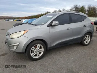 2013 Hyundai Tucson GLS with VIN KM8JU3AC2DU631636, listed as a Copart auction lot 53280025 with 205,311 mi miles and Non Repairable. Bid and sale history available at carsss.com. Image 1.