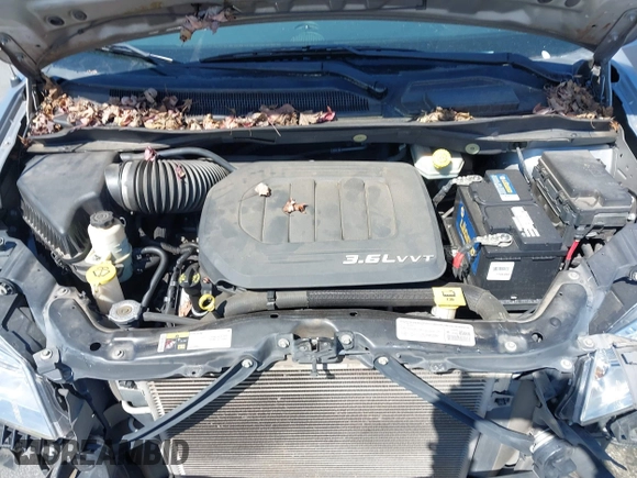 2014 Dodge Grand Caravan SXT with VIN 2C4RDGCGXER261467, listed as a IAAI auction lot 41801810 with 97,322 mi miles and . Bid and sale history available at DreamBid. Image 10.