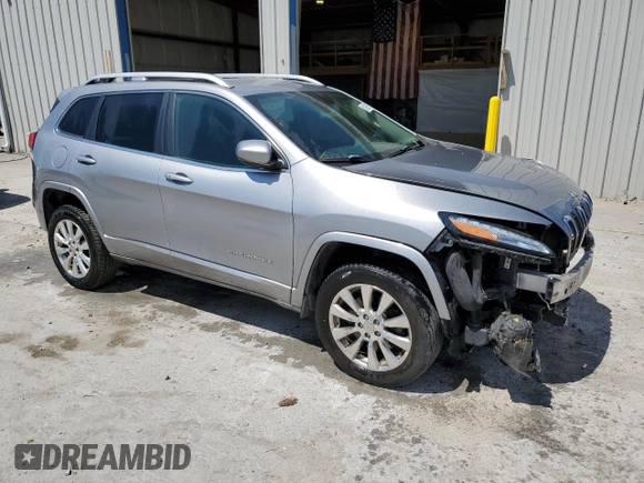 2016 Jeep Cherokee Overland z VIN 1C4PJMJSXGW300719, wystawiony jako Copart lot #58216665 z przebiegiem 128 016 mil mil oraz Szkoda całkowita • Salvage title. Historia ofert i sprzedaży dostępna na DreamBid. Obrazek 4.