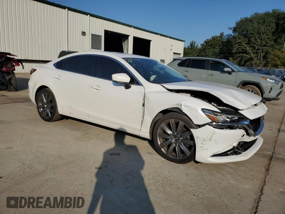 2019 Mazda 6 Grand Touring with VIN JM1GL1TY4K1507123, listed as a Copart auction lot 74100054 with 63,809 mi miles and Salvage Title. Bid and sale history available at carsss.com. Image 4.