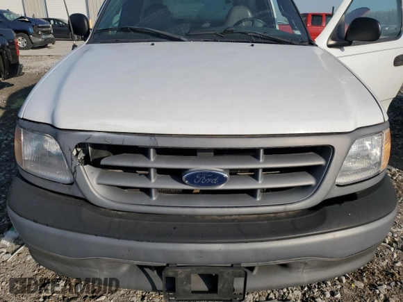 2002 Ford F-150 XL with VIN 1FTRF17262NA04126, listed as a Copart auction lot 51296715 with 98,710 mi miles and Salvage Title. Bid and sale history available at carsss.com. Image 12.