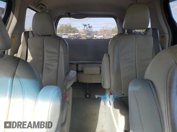 2014 Toyota Sienna Limited z VIN 5TDDK3DC5ES083494, wystawiony jako Copart lot #88325745 z przebiegiem 130 476 mil mil oraz Szkoda całkowita • Salvage title. Historia ofert i sprzedaży dostępna na DreamBid. Obrazek 10.