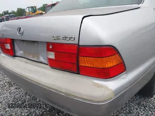 1999 Lexus LS 400 z VIN JT8BH28F1X0162721, wystawiony jako IAAI lot #42379655 z przebiegiem 316 746 mil mil oraz . Historia ofert i sprzedaży dostępna na DreamBid. Obrazek 13.