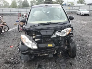 2009 Smart fortwo Passion z VIN WMEEK31XX9K267579, wystawiony jako Copart lot #63469494 z przebiegiem 110 705 mil mil oraz Szkoda całkowita • Salvage title. Historia ofert i sprzedaży dostępna na DreamBid. Obrazek 5.