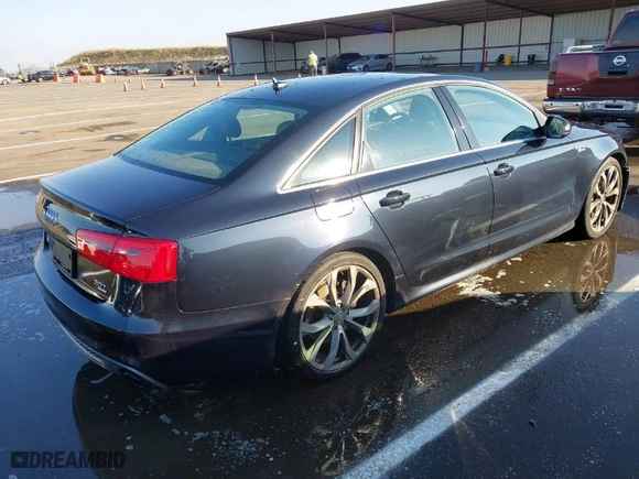 2012 Audi A6 3.0T Prestige with VIN WAUHGBFC8CN174740, listed as a IAAI auction lot 41439297 with 84,570 mi miles. Bid and sale history available at carsss.com. Image 4.