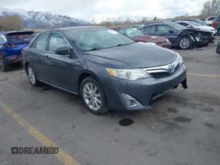 2012 Toyota Camry XLE z VIN 4T1BD1FK9CU059021, wystawiony jako IAAI lot #41932696 z przebiegiem 194 292 mil mil oraz . Historia ofert i sprzedaży dostępna na DreamBid. Obrazek 1.
