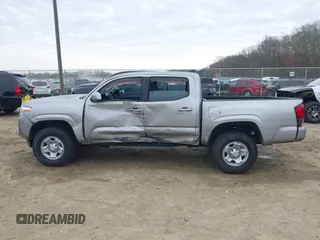 2018 Toyota Tacoma SR with VIN 3TMCZ5AN4JM130307, listed as a IAAI auction lot 41541477 with 74,369 mi miles and . Bid and sale history available at DreamBid. Image 15.