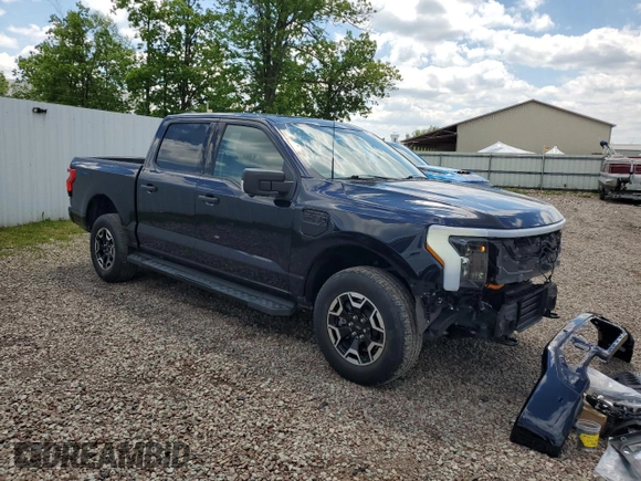 2022 Ford F-150 Lightning Pro z VIN 1FTVW1EL6NWG04931, wystawiony jako Copart lot #59096435 z przebiegiem 26 616 mil mil oraz Szkody całkowita. Historia ofert i sprzedaży dostępna na DreamBid. Obrazek 4.
