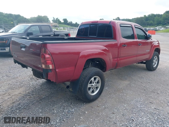 2014 Toyota Tacoma with VIN 3TMMU4FN8EM068048, listed as a IAAI auction lot 42633506 with 126,339 mi miles and . Bid and sale history available at DreamBid. Image 4.