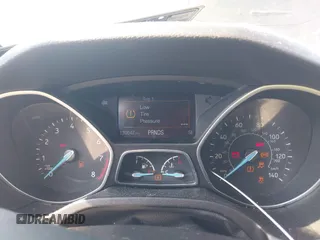 2015 Ford Focus SE z VIN 1FADP3F25FL284097, wystawiony jako IAAI lot #42553323 z przebiegiem 139 647 mil mil oraz . Historia ofert i sprzedaży dostępna na DreamBid. Obrazek 7.