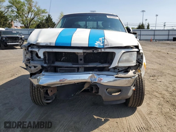 2002 Ford F-150 XL z VIN 1FTRX18LX2NA09494, wystawiony jako Copart lot #55255925 z przebiegiem 331 667 mil mil oraz Szkoda całkowita • Salvage title. Historia ofert i sprzedaży dostępna na DreamBid. Obrazek 5.