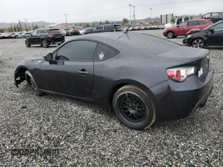 2013 Scion FR-S with VIN JF1ZNAA11D2705024, listed as a Copart auction lot 48428305 with 118,514 mi miles and Salvage Title. Bid and sale history available at carsss.com. Image 2.