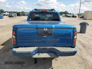 2003 Nissan Frontier XE z VIN 1N6ED27TX3C434061, wystawiony jako Copart lot #56834655 z przebiegiem 208 857 mil mil oraz Szkody całkowita. Historia ofert i sprzedaży dostępna na DreamBid. Obrazek 6.