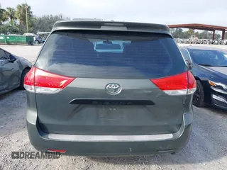 2014 Toyota Sienna L with VIN 5TDZK3DC6ES421278, listed as a IAAI auction lot 41178679 with 202,823 mi miles. Bid and sale history available at carsss.com. Image 16.