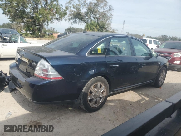2009 Ford Taurus Limited with VIN 1FAHP25W59G124413, listed as a Copart auction lot 77771044 with 228,831 mi miles and Salvage Title. Bid and sale history available at carsss.com. Image 3.