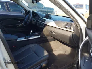 2016 BMW 3 Series 320i with VIN WBA8A9C59GK615704, listed as a IAAI auction lot 41431347 with 76,827 mi miles. Bid and sale history available at carsss.com. Image 5.