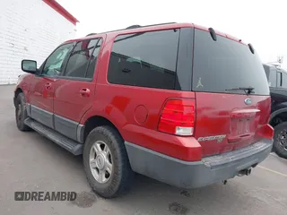 2004 Ford Expedition XLT with VIN 1FMPU16W54LB57799, listed as a IAAI auction lot 41538969 with 289,424 mi miles. Bid and sale history available at carsss.com. Image 3.
