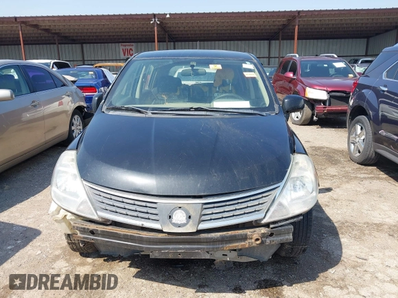 2009 Nissan Versa 1.8 S with VIN 3N1BC13E59L499006, listed as a IAAI auction lot 41953194 with 179,330 mi miles. Bid and sale history available at carsss.com. Image 12.