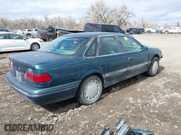 1995 Ford Taurus GL with VIN 1FALP52U2SA113070, listed as a IAAI auction lot 41869576 with 16,935 mi miles and . Bid and sale history available at DreamBid. Image 4.