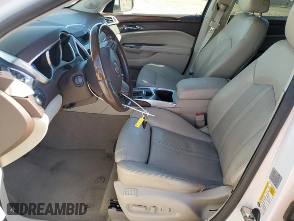 2012 Cadillac SRX Premium Collection с VIN 3GYFNFE30CS534835, выставлен на аукционе Copart как лот 63681235 с пробегом 124 964 миль миль и Списание • Salvage title. История ставок и продаж доступна на DreamBid. Изображение 7.