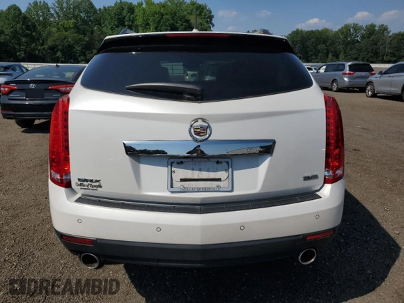 2014 Cadillac SRX Performance Collection with VIN 3GYFNCE38ES629600, listed as a Copart auction lot 61622725 with 86,183 mi miles and Salvage title. Bid and sale history available at DreamBid. Image 6.
