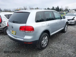 2006 Volkswagen Touareg 4.2L V8 z VIN WVGZM77L06D043948, wystawiony jako IAAI lot #41839431 z przebiegiem 207 496 mil mil oraz . Historia ofert i sprzedaży dostępna na DreamBid. Obrazek 4.