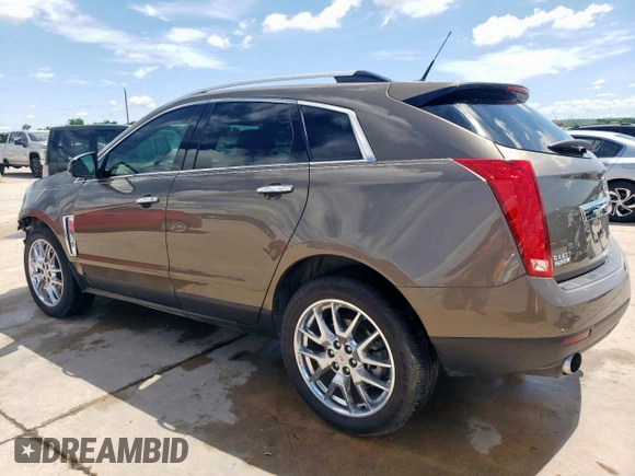 2014 Cadillac SRX Premium Collection with VIN 3GYFNDE33ES567108, listed as a Copart auction lot 55970265 with 97,720 mi miles and Salvage title. Bid and sale history available at DreamBid. Image 2.