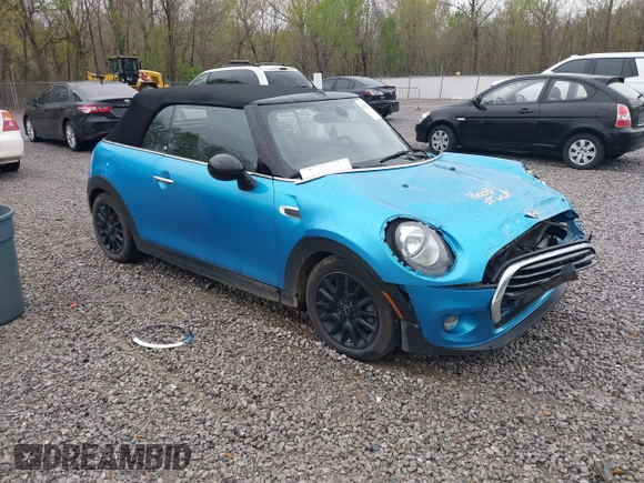 2016 MINI Convertible with VIN WMWWG5C52G3A81084, listed as a IAAI auction lot 41954333 with 78,558 mi miles and . Bid and sale history available at DreamBid. Image 1.