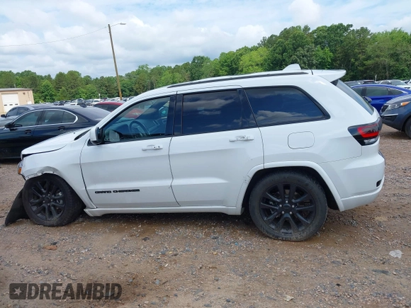 2019 Jeep Grand Cherokee Altitude z VIN 1C4RJEAG7KC533316, wystawiony jako IAAI lot #42471064 z przebiegiem 142 299 mil mil oraz . Historia ofert i sprzedaży dostępna na DreamBid. Obrazek 14.