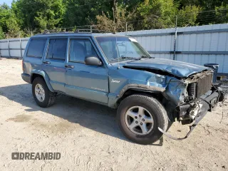 1998 Jeep Cherokee Sport with VIN 1J4FJ68S6WL283022, listed as a Copart auction lot 57451125 with 207,618 mi miles and Salvage title. Bid and sale history available at DreamBid. Image 4.